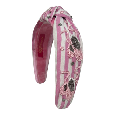 Pink and white striped knotted headband with beaded ballet shoe design.