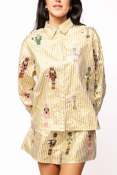 Queen of Sparkles Gold Metallic Stripe Serving Nutcracker Button Up with colorful sequin nutcrackers on gold and white striped fabric.