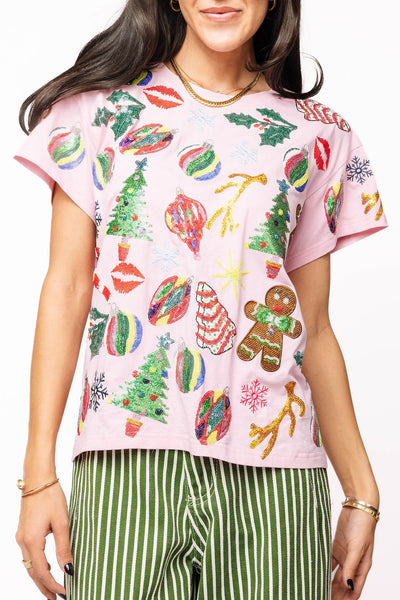 Queen of Sparkles Light Pink Christmas Icons Tee featuring multicolor sequin ornaments, trees, and gingerbread details.